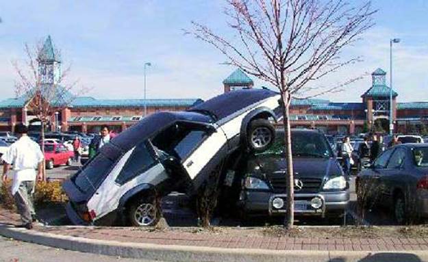 http://cutelaughs.com/Funny_Accidents_and_Mishaps_Pictures/Nice%20Parking%203.jpg