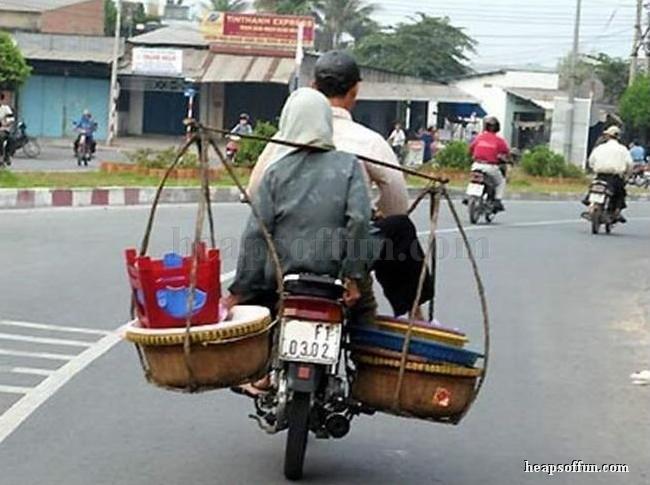 http://www.heapsoffun.com/pictures/20120207/funny_motorcycle_art_of_carrying_loads_m1002.jpg