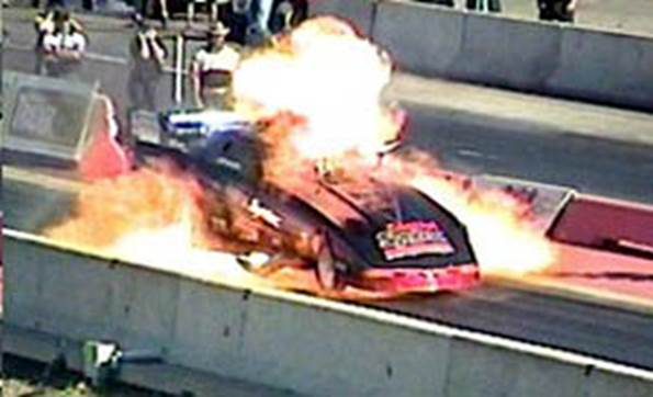 http://www.draglist.com/photoimages/Photos-2002/Jason%20DuChene%20suffered%20one%20of%20the%20mose%20intense%20funny%20car%20explosions%20in%20recent%20memory.%20Photo%20by%20Sheryl%20Ogonoski.jpg
