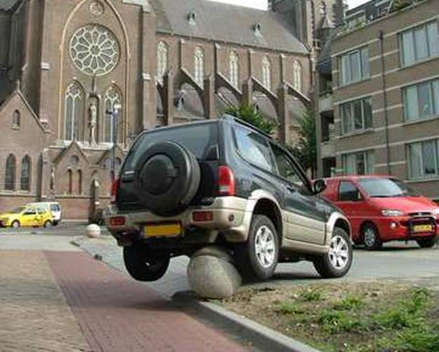 http://www.funnybeez.com/funnypictures/bad-parking-job.jpg