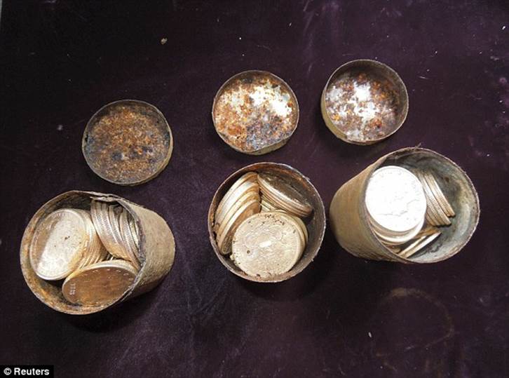 Booty: A trove of rare Gold Rush-era coins unearthed in California last year by a couple as they walked their dog may be the greatest buried treasure ever found in the United States, worth more than $10million