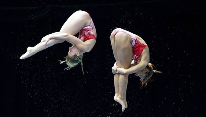 http://www.thestar.com/content/dam/thestar/sports/olympics/2012/05/06/canadian_divers_emilie_heymans_jennifer_abel_win_synchro_gold/heymanssynchro.jpeg