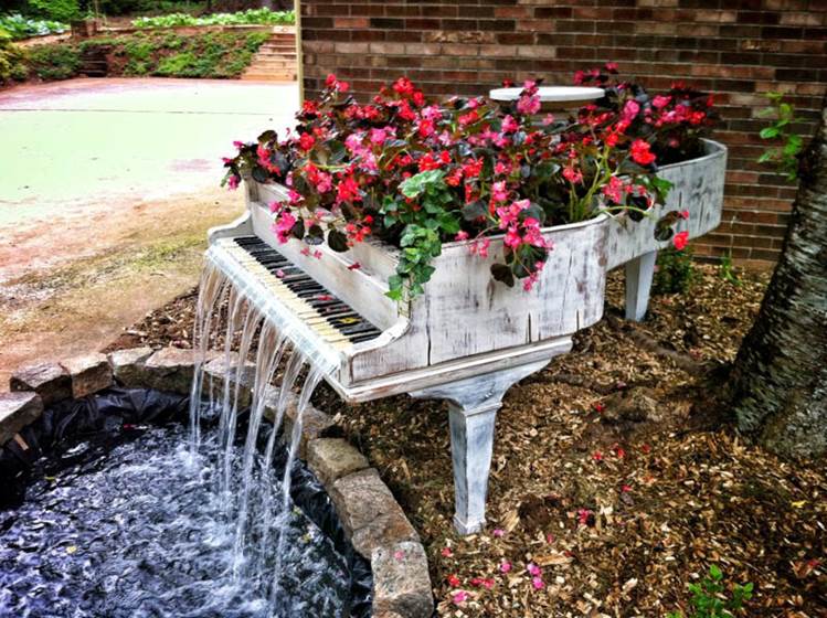 http://twistedsifter.files.wordpress.com/2012/06/old-piano-turned-into-outdoor-water-fountain.jpg