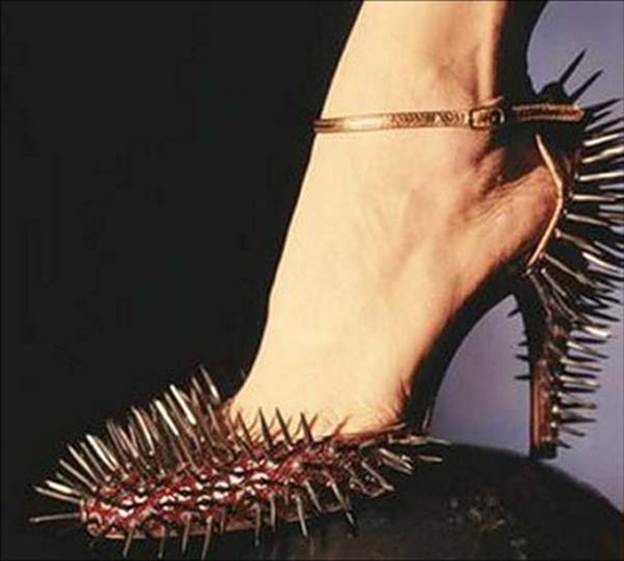 http://cdn2.list25.com/wp-content/uploads/2012/06/Spiky-shoes.jpg