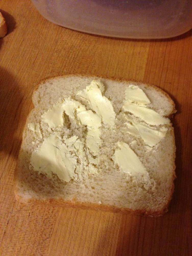 Hard butter on soft bread.