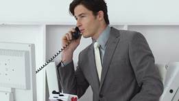 Image result for young business man on the office phone