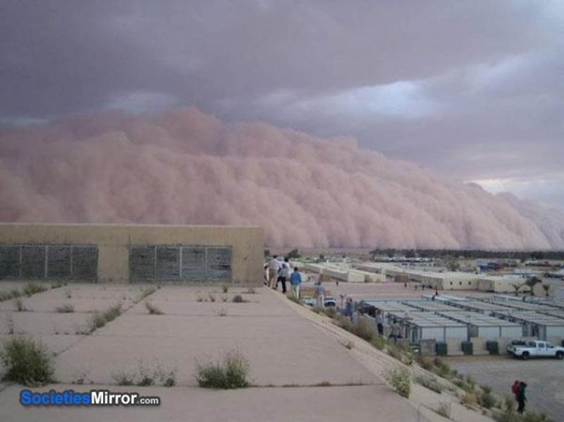 http://societiesmirror.com/image/funny-pictures/1009/looks-like-bad-weather-sandstorm-iraq-50cal-funny-pictures-1285879796.jpg