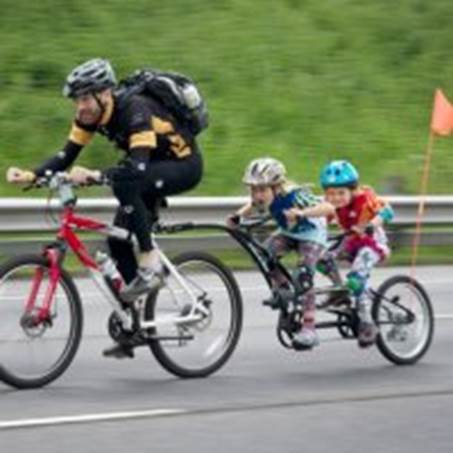 http://crazyhyena.com/imagebank/m/funny-man-rides-a-bike-with-his-kids.jpg
