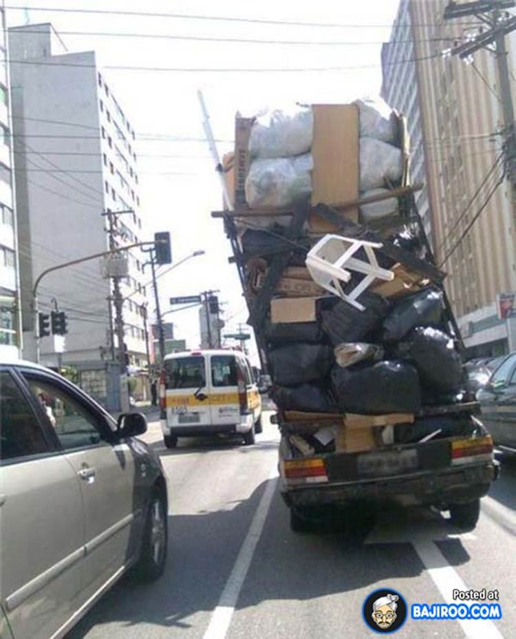 http://bajiroo.com/wp-content/uploads/2013/05/funny-overloaded-truck-fails-transporting-pics-images-photos-picture.jpg