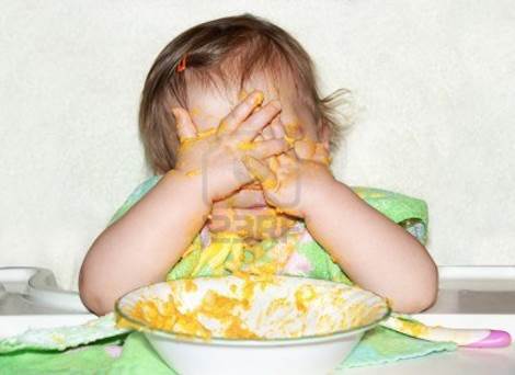 http://us.123rf.com/400wm/400/400/mirage3/mirage31208/mirage3120800037/14920086-funny-baby-with-food-covered-face-by-putting-her-hands-over-her-eyes-to-play-picaboo-during-mealtime.jpg