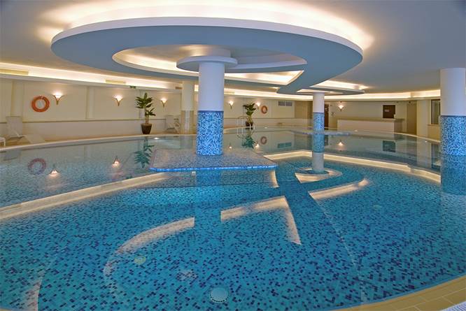 http://www.onarchitecturesite.com/images/beautiful-indoor-swimming-pool-with-ceiling-light-ideas-for-2013-design-reference.jpg