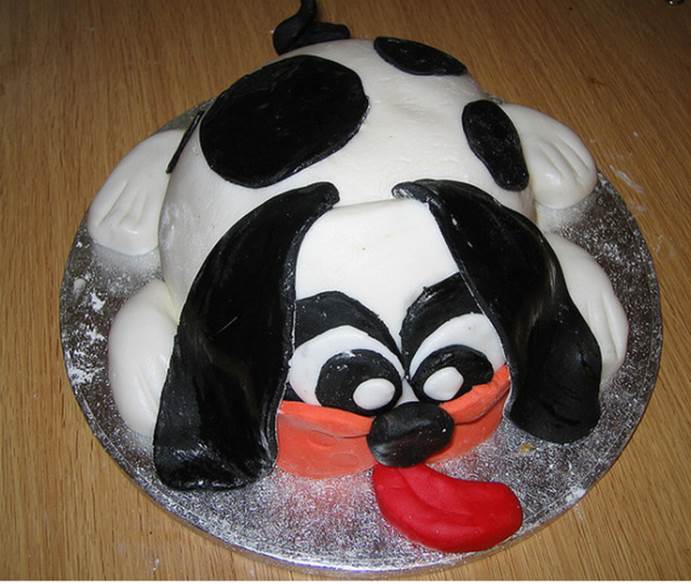 http://cakepicturegallery.com/d/39321-2/Cute+and+funny+dog+birthday+cake+picture.PNG