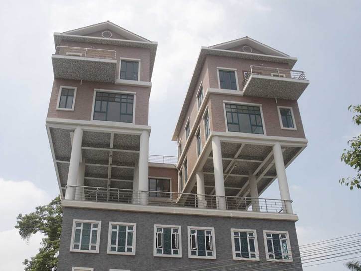 http://static6.businessinsider.com/image/5231876d69beddc179966706/locals-are-questioning-the-legality-of-these-bizarre-chinese-houses-in-the-sky.jpg