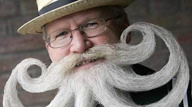 http://guardianlv.com/wp-content/uploads/2013/11/166918-bristly-news-movember-campaign-kicks-off-as-men-grow-a-moustache-for-cancer-awareness-1.jpg