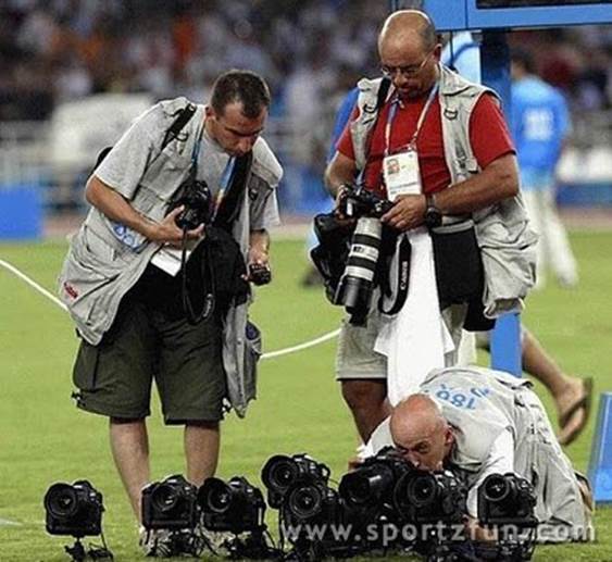 http://sportzfun.com/photo/cache/theme/fans/cameraman_500_copyright.jpg