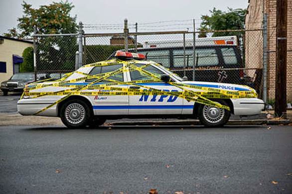 http://lolpranks.com/wp-content/uploads/2011/01/cop-car-police-prank-wrapped-with-tape.jpeg