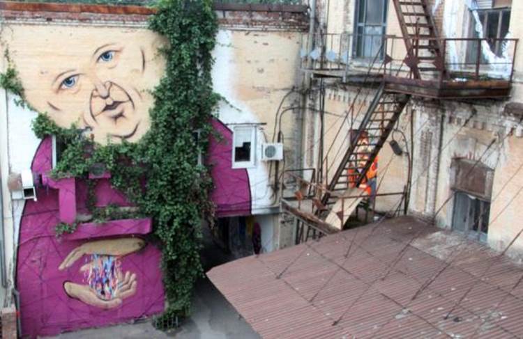 Street art face with a beard made of vines in Rostov-on-Don, Russia