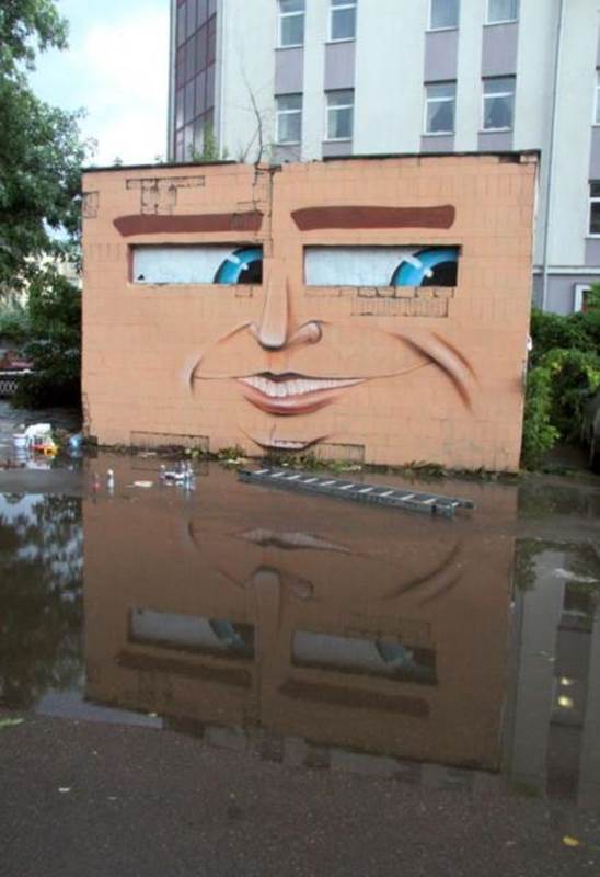 Face with blue eyes painted on wall in Kazan, Russia.