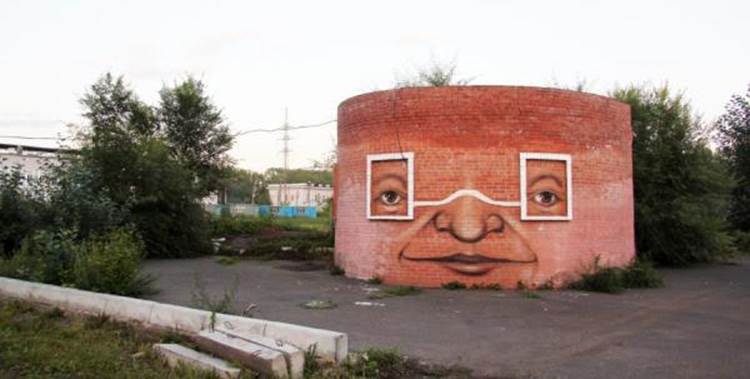 Graffiti face painted on brick structure in Krasnoyarsk, Russia