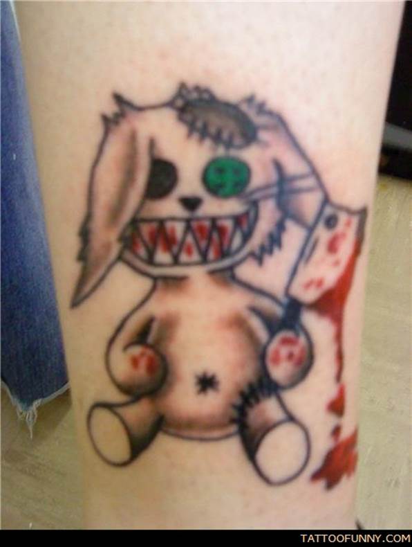 http://tattoofunny.com/wp-content/uploads/2011/09/funny-tattoos-bad-bunny.jpg