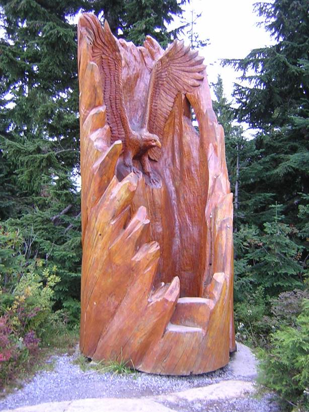 http://whiteeaglestudios.files.wordpress.com/2010/01/eagle-chainsaw-carving-grouse-mountain-vancouver.jpg