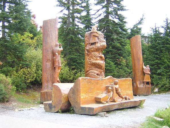 http://freephotooftheday.clientk.com/wp02/wp-content/uploads/2008/02/family-chainsaw-carvings-grouse-mountain-vancouver.jpg