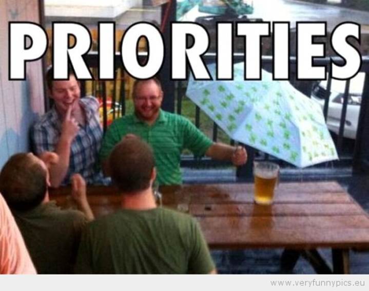 http://media.veryfunnypics.eu/2012/07/funny-picture-priorities-umbrella-for-the-beer-555x438.jpg