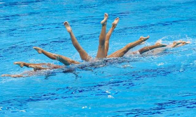 http://static.guim.co.uk/sys-images/Guardian/Pix/pictures/2012/4/17/1334682639966/Synchronised-swimming-008.jpg