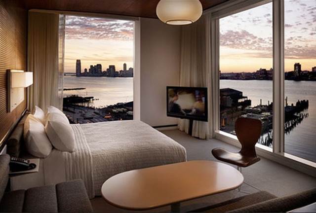 http://cdn.decoist.com/wp-content/uploads/2012/03/new-york-bedroom-sunrise-panoramic-view.jpg