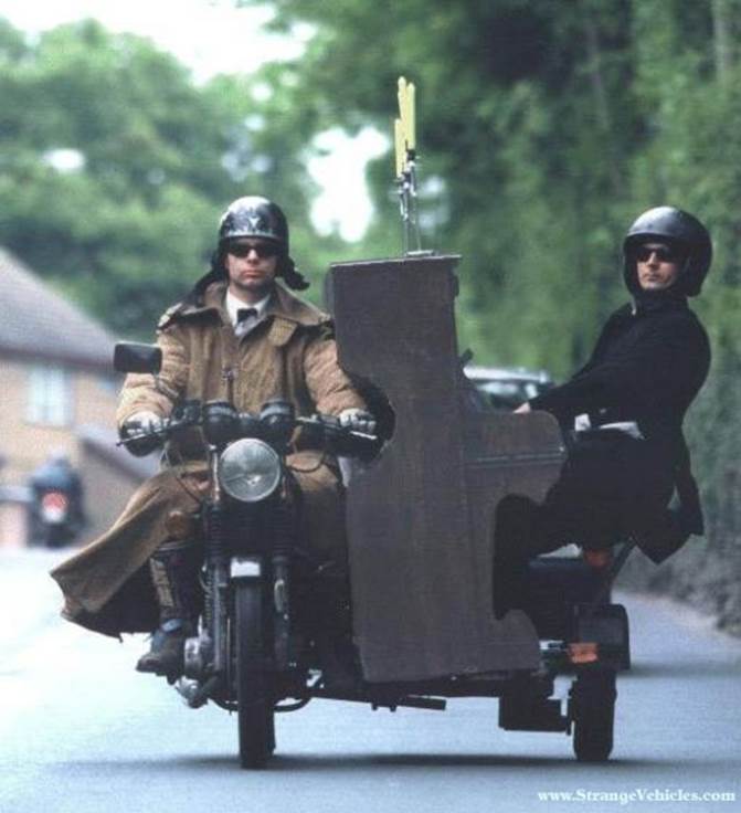 STRANGE MOTORCYCLE WITH SIDECAR PIANO & CANDELABRA