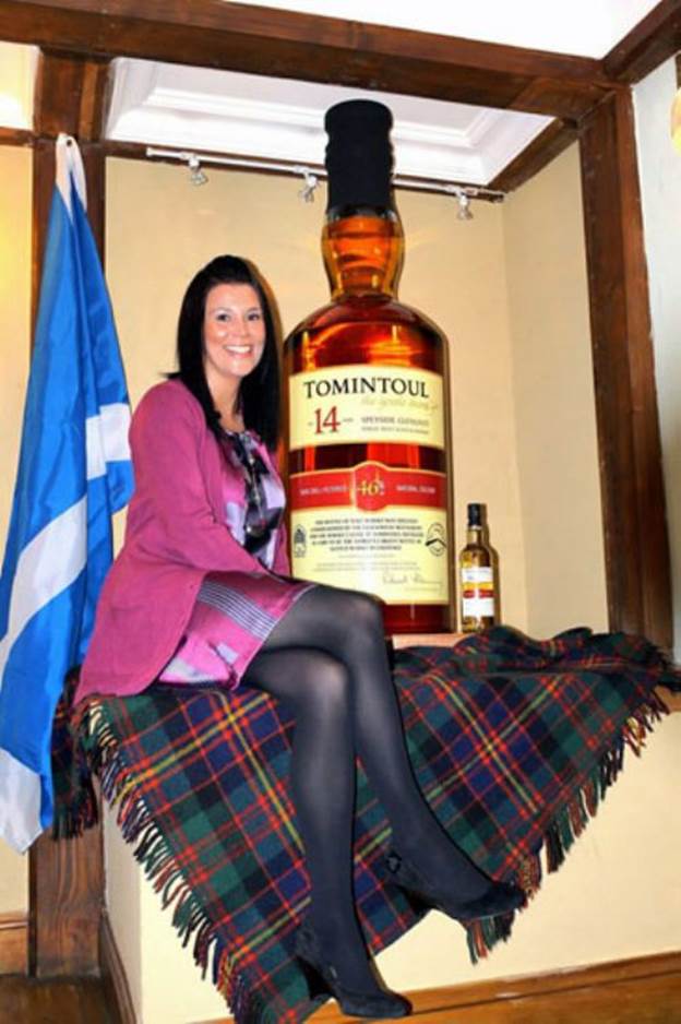 Bottle Of Whiskey--Created by the Tomintoul Distillery in Banffshire, UK. it stands at about 5 feet tall, weighs 164 kg, and holds 28 gallons of their signature drink.