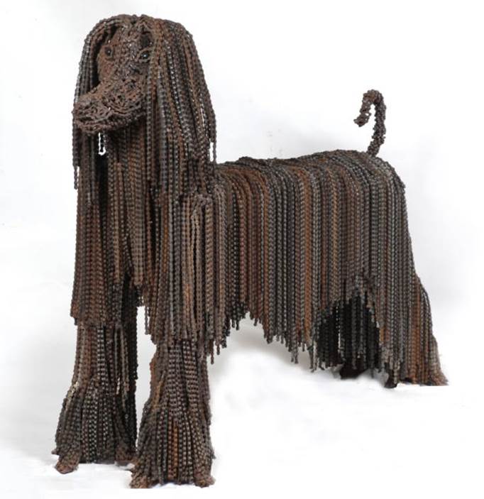 She was inspired to tansform strings of bike chains into the long coat of an Afghani dog