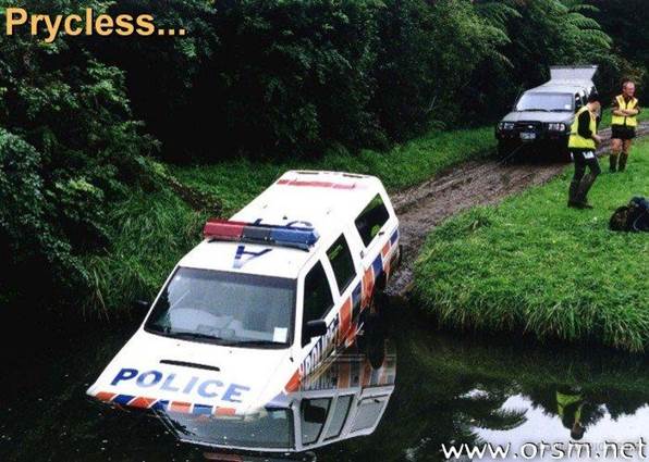 http://www.coolfunpics.com/slides/Police_Car_Crash_in_River.jpg