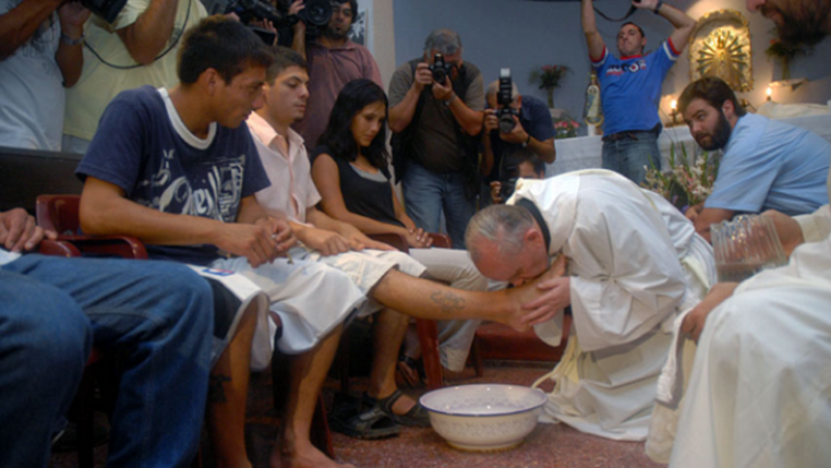 http://cdn.list25.com/wp-content/uploads/2013/05/pope-washes-feet-e1409102085919.png