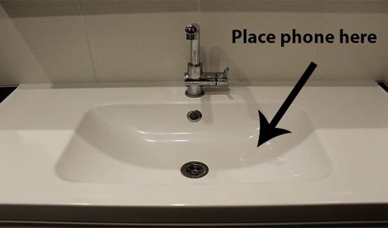 Putting your phone in the sink will amplify the sound. It makes for a great radio!