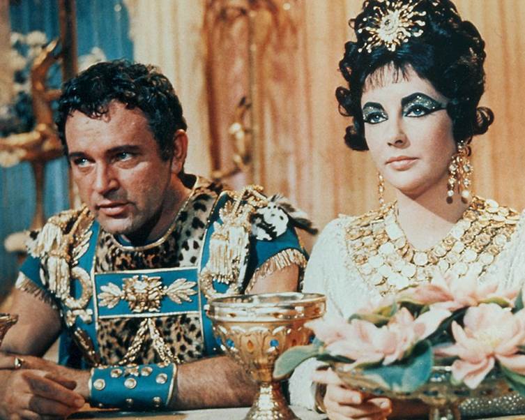 'Cleopatra’ (1963) - Elizabeth Taylor & Richard Burton Liz Taylor and Richard Burton’s fiery relationship is one of the most famous in celebrity history. The pair were married and divorced a couple of times and kept gossipers the world over chattering with their wild behaviour.Their beginnings were not without controversy either – Liz left her singer hubby Eddie Fisher for the Welsh acting legend thanks to a public affair during the shooting of the Egyptian epic. Taylor and Fisher’s pairing had always been slightly frowned upon anyway since Liz’s ex before Eddie was Eddie’s best friend who had died. And Eddie left America’s darling Debbie Reynolds for Taylor. Confusing, eh?!