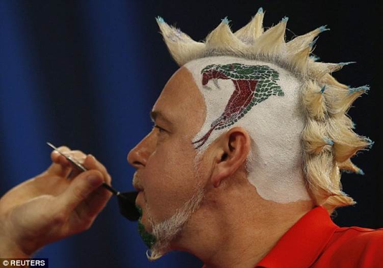 Peter Wright saw off Keegan Brown in a straightforward win at the Alexandra Palace with his wild look