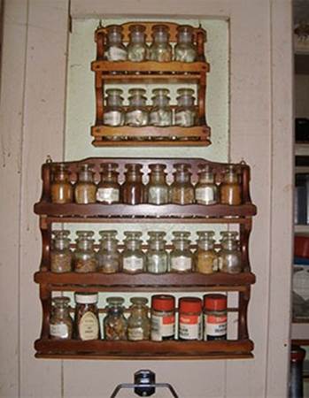 Spice racks are a really good way to hang lotions and other products